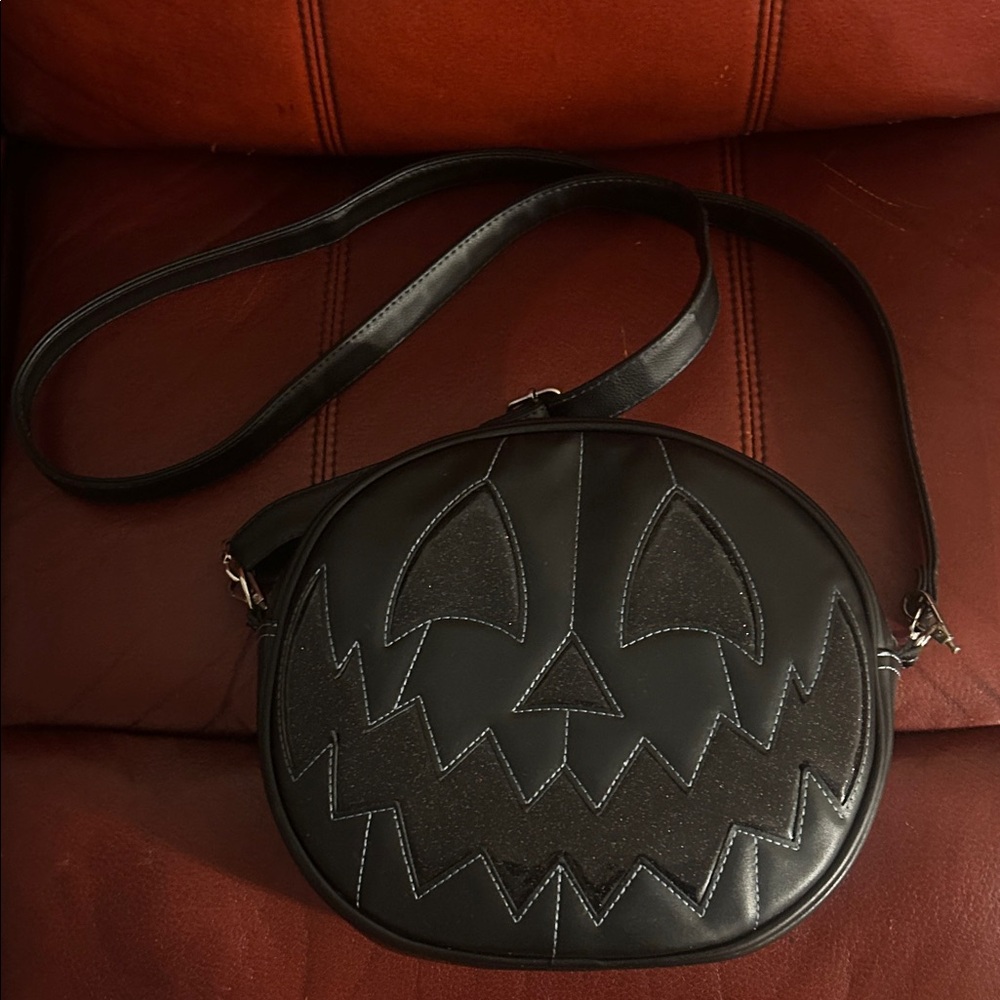 Love, Pain and Stitches Black Glitter Pumpkin Face Crossbody Bag